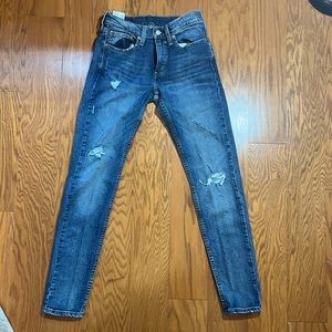 Levi’s skinny taper blue jeans.
